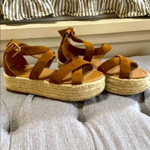 Brown flat bottom sandals